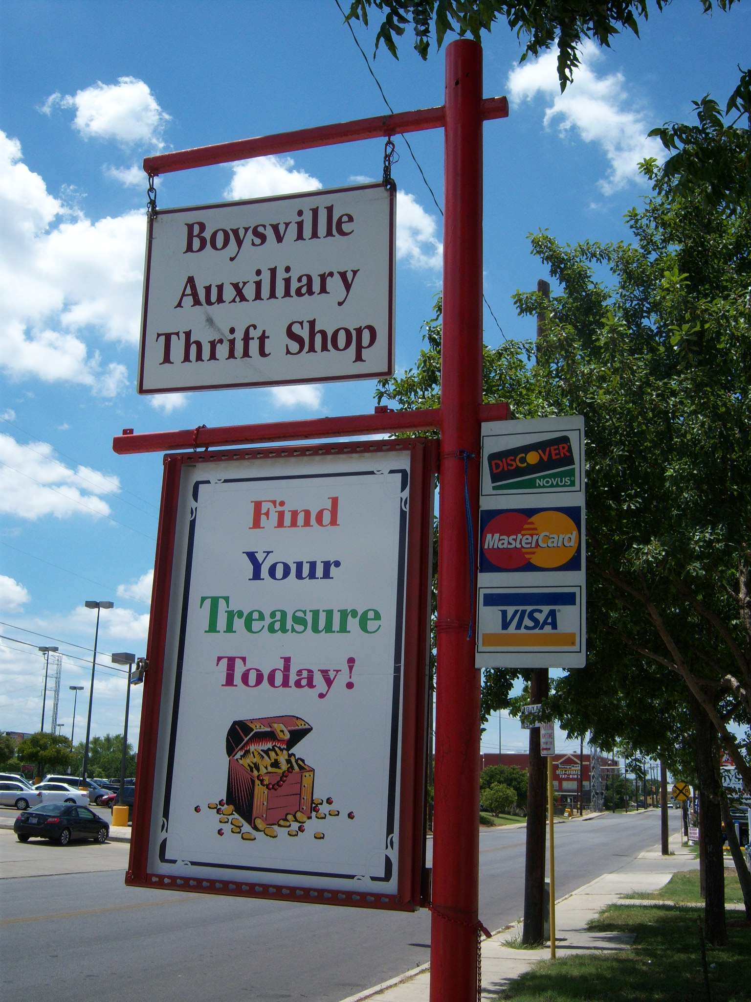 Photo of the sign outside of the Boysville Thrift Store on West Olmos Drive.