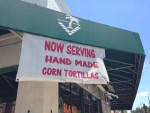 Photo of sign that reads "Now serving hand made corn tortillas" at the Blanco Cafe.