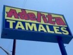 Photo of exterior signage at Adelita Tamales & Tortilla Factory.