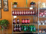 Photo of shelves of soft drinks at Adelita Tamales & Tortilla Factory.