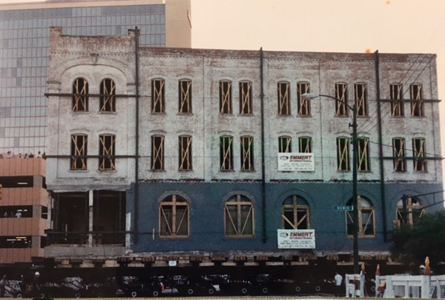 Photo of the Fairmount Hotel moving six blocks through the streets of downtown San Antonio.