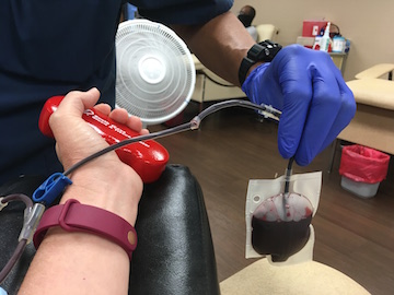 Photo of giving blood at the South Texas Blood and Tissue Center