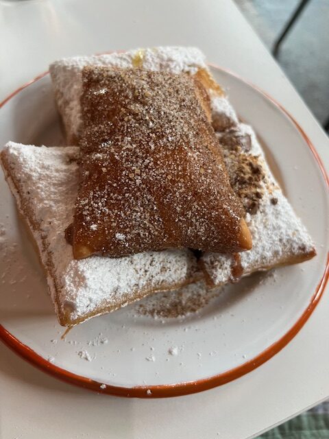 Photo of a mixed plate of beignets at NOLA Brunch and Beignets